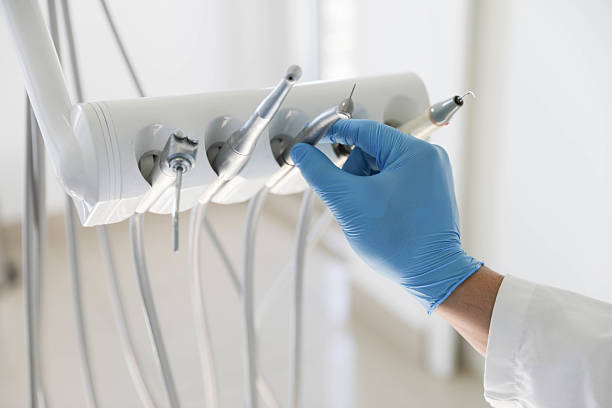Professional Emergency Dentist technician working in Harper Woods, MI